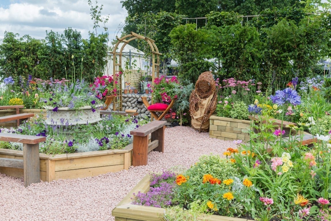 The Therapeutic Garden. Designed by Tony Wagstaff. Sponsored by Southend-on-Sea Borough Council, Wood BlocX, Formara Print+, Sovereign, CED Stone and Scope. RHS Hampton Court Palace Garden Festival 2019. Stand no. 464 RHS Hampton Court Palace Garden Festival